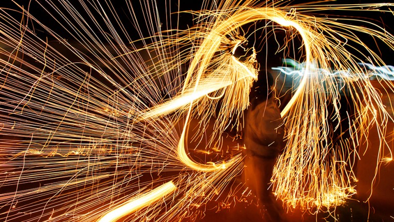 Fireworks and man dancing